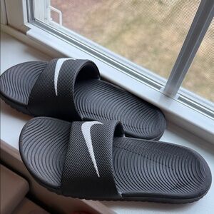Nike Black Slides with White Swoosh Strap